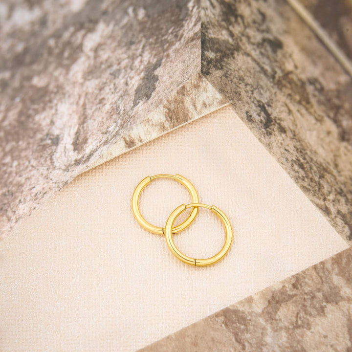 ZUDO-encase-signature-hoops-gold-flatlay